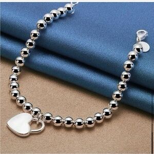 NWT- Trending Beaded Bracelet with Heart Charm.